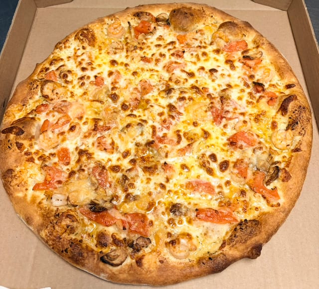 Shrimp Scampi Pizza.